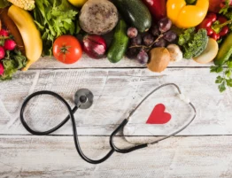 vegetables and stethoscope on the table